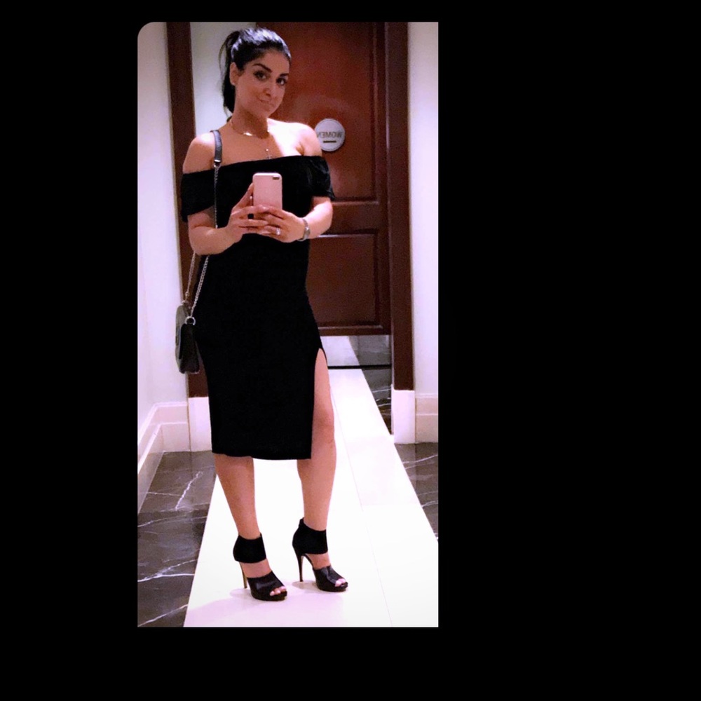 Black midi dress with high slit